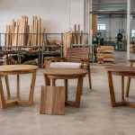 Acacia, eucalyptus and teak outdoor furniture samples in a Vietnamese factory