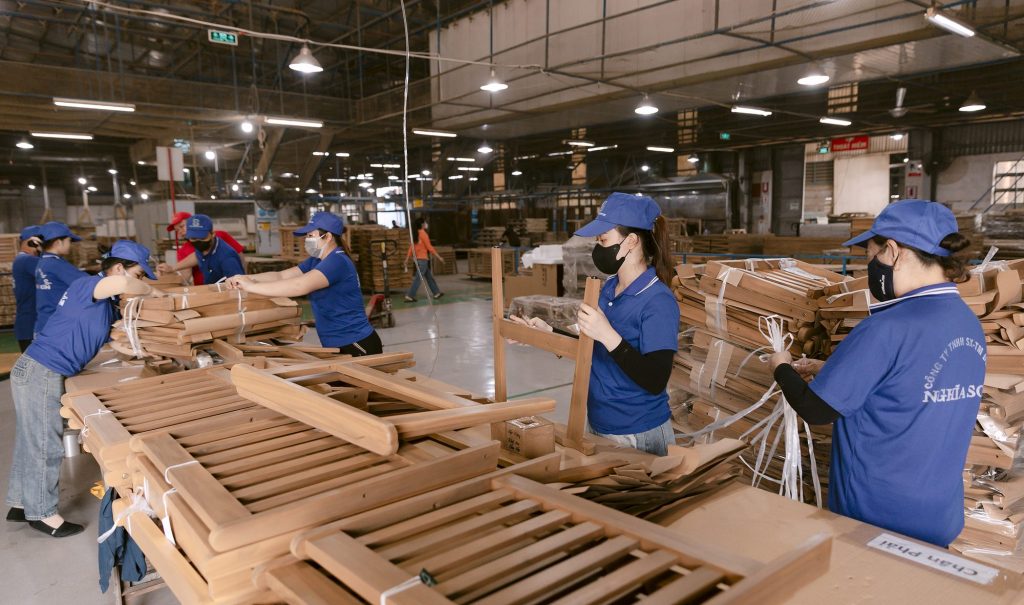 Solid-wood furniture for retailers being assembled at Nghia Son